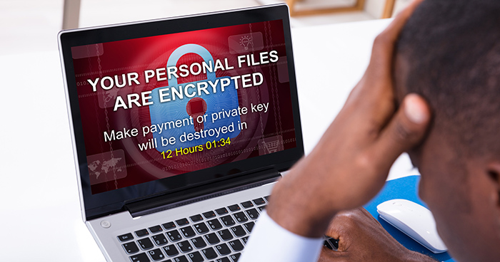 Man sees laptop message that his personal files are encrypted and if ransom is not paid, his private key will be destroyed.