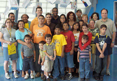 Enjoying a day packed with fun at the inaugural Downs Group Adopt-A-Family
outing, held at the Miami Children’s Museum.