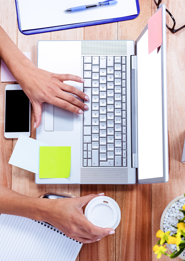 Hands at a desk during a financial planning meeting